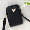 Sac bandoulière brodé en forme de losange et de papillon