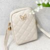 Sac bandoulière brodé en forme de losange et de papillon