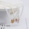 Collier de perles avec nœud papillon en opale