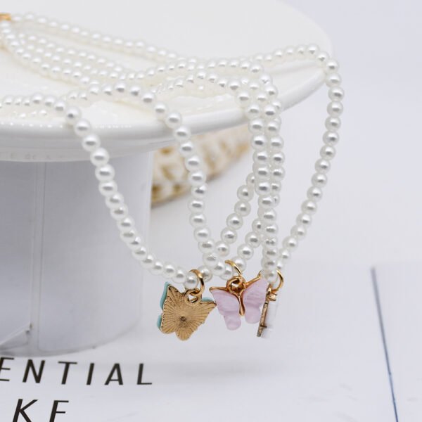 Collier de perles avec nœud papillon en opale