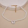 Collier de perles avec nœud papillon en opale